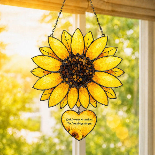 Acrylic sunflower memorial ornament with yellow petals, brown details and a heart-shaped remembrance message