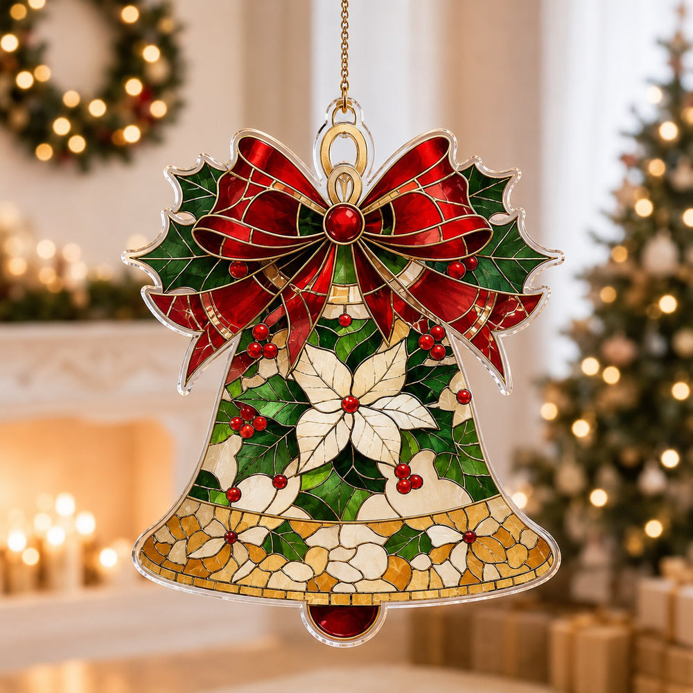 Bell-shaped acrylic Christmas ornament with a red bow, holly leaves, berries and a floral pattern